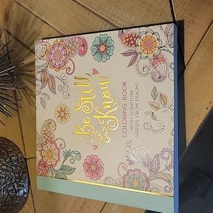 Adult coloring book with scripture verses..